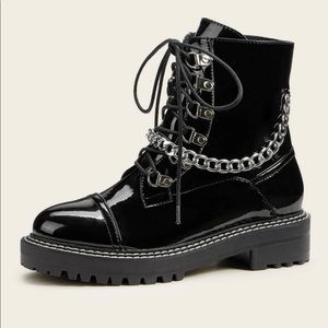 Black combat boots with chain